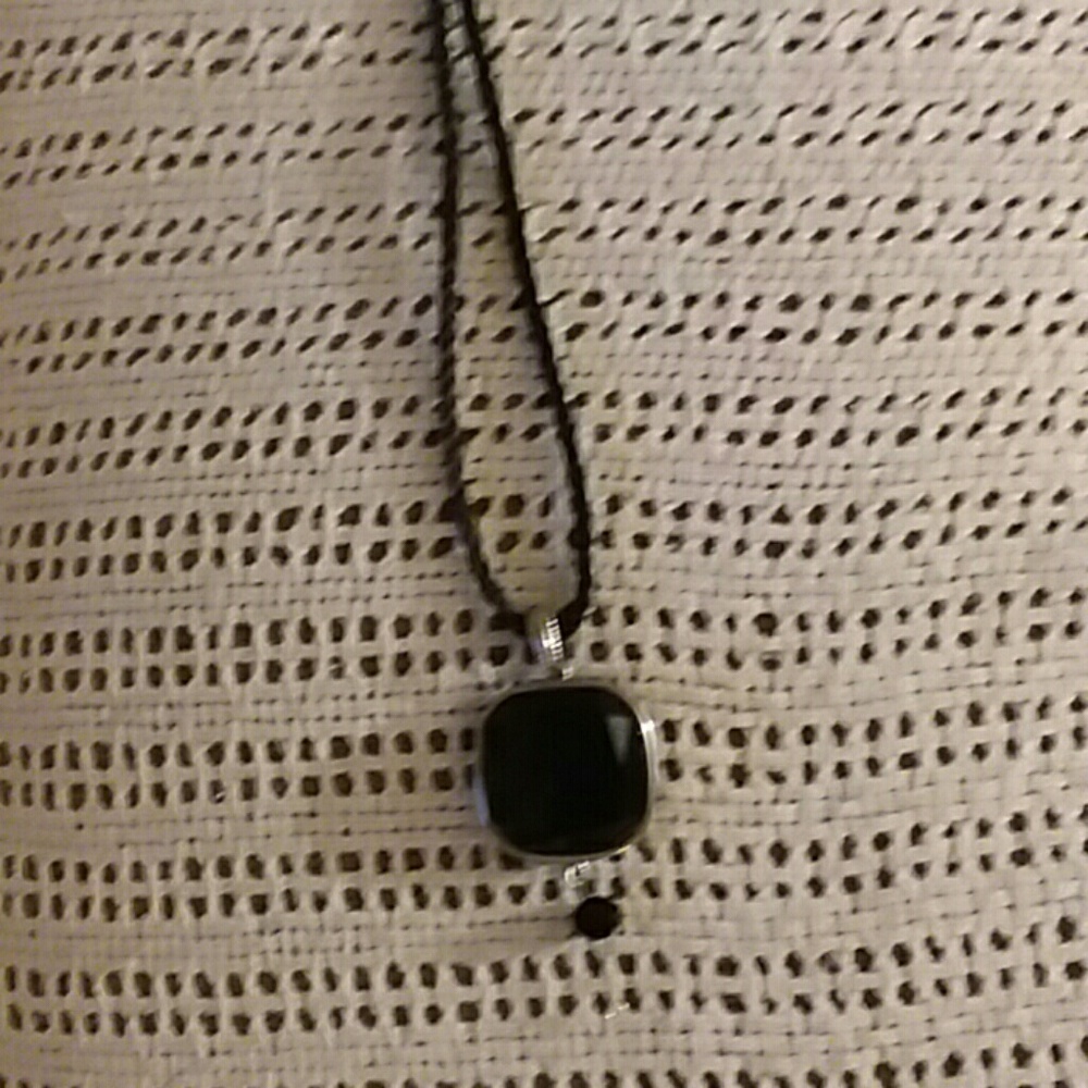 Necklace with black and silver pendant